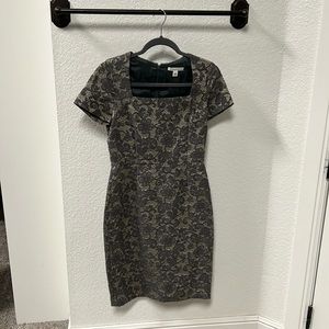 Grey/taupe dress. Dress is so much cuter on than in the picture.